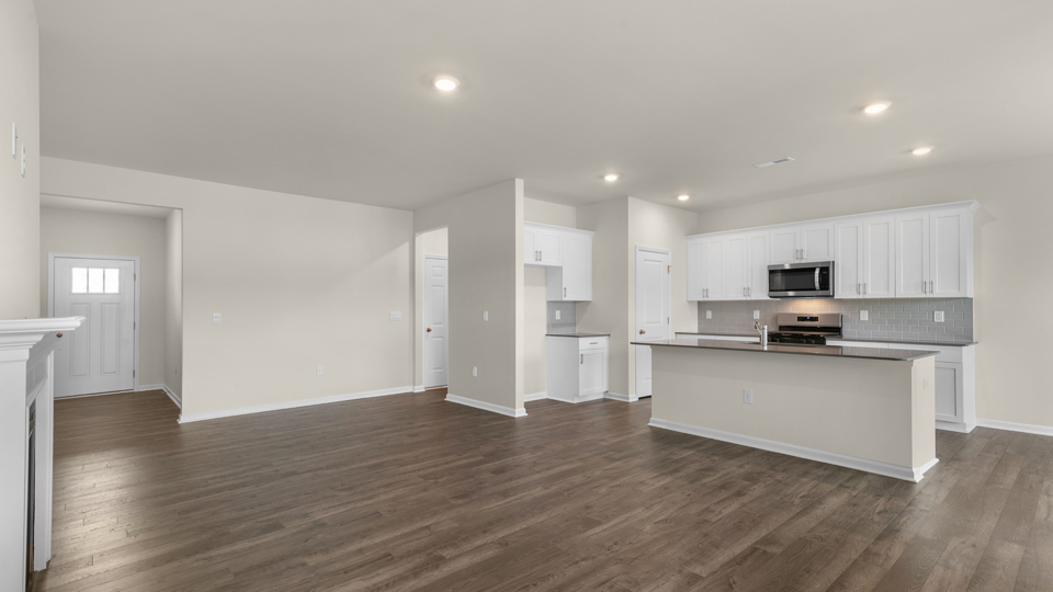 open concept living space with large windows