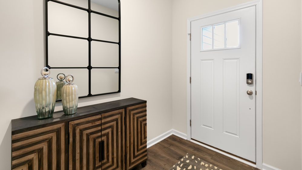 foyer entryway with revwood flooring