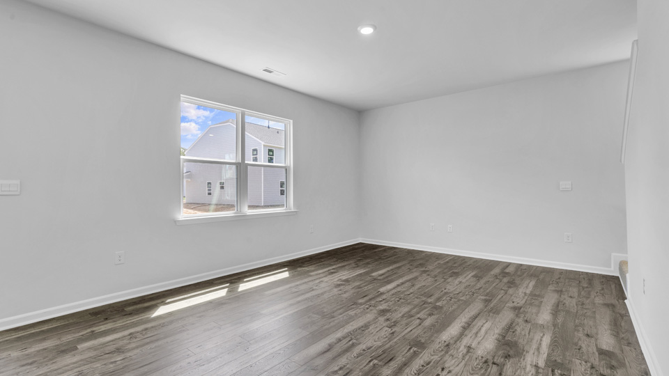living room with revwood flooring