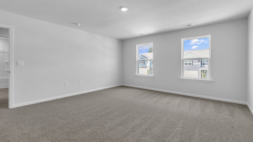 loft with carpet flooring