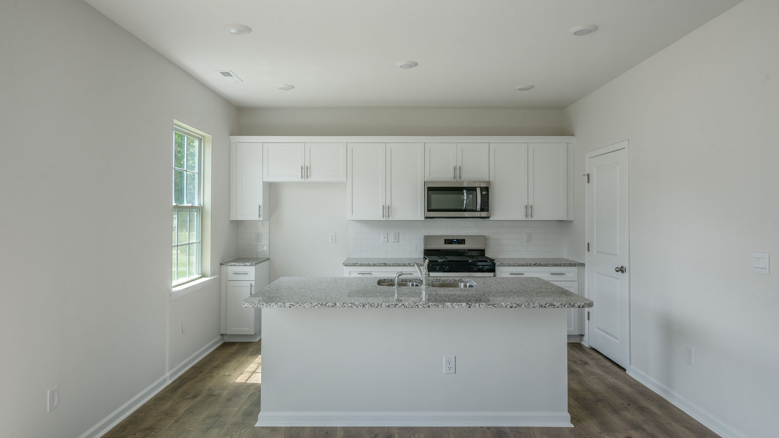 Kitchen with white cabinets