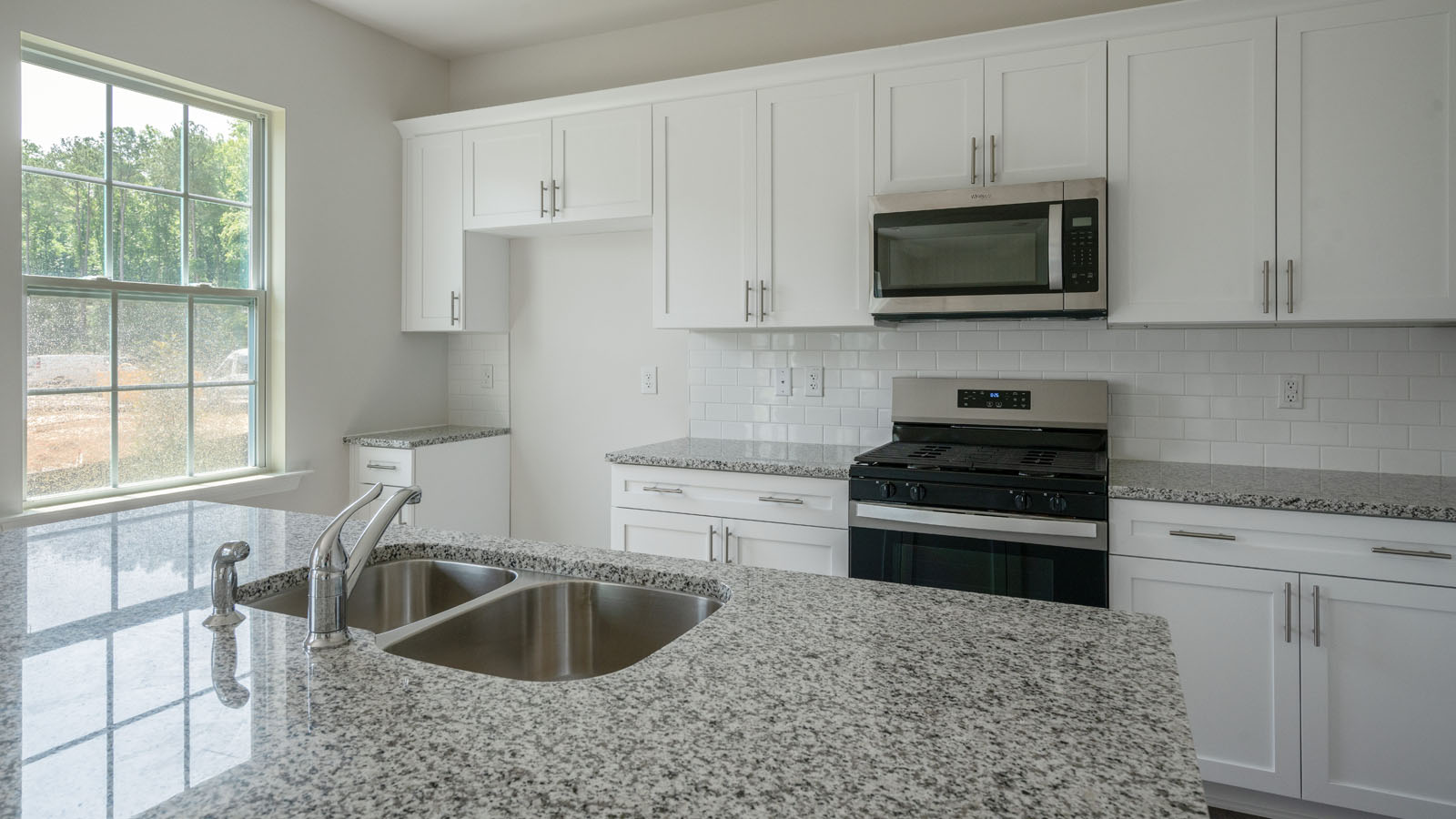 Kitchen with white cabinets