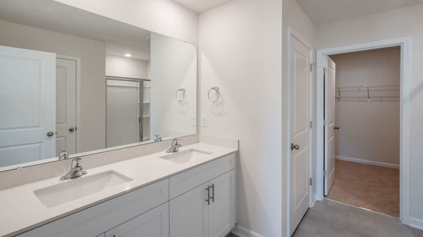 Bathroom with white cabinets