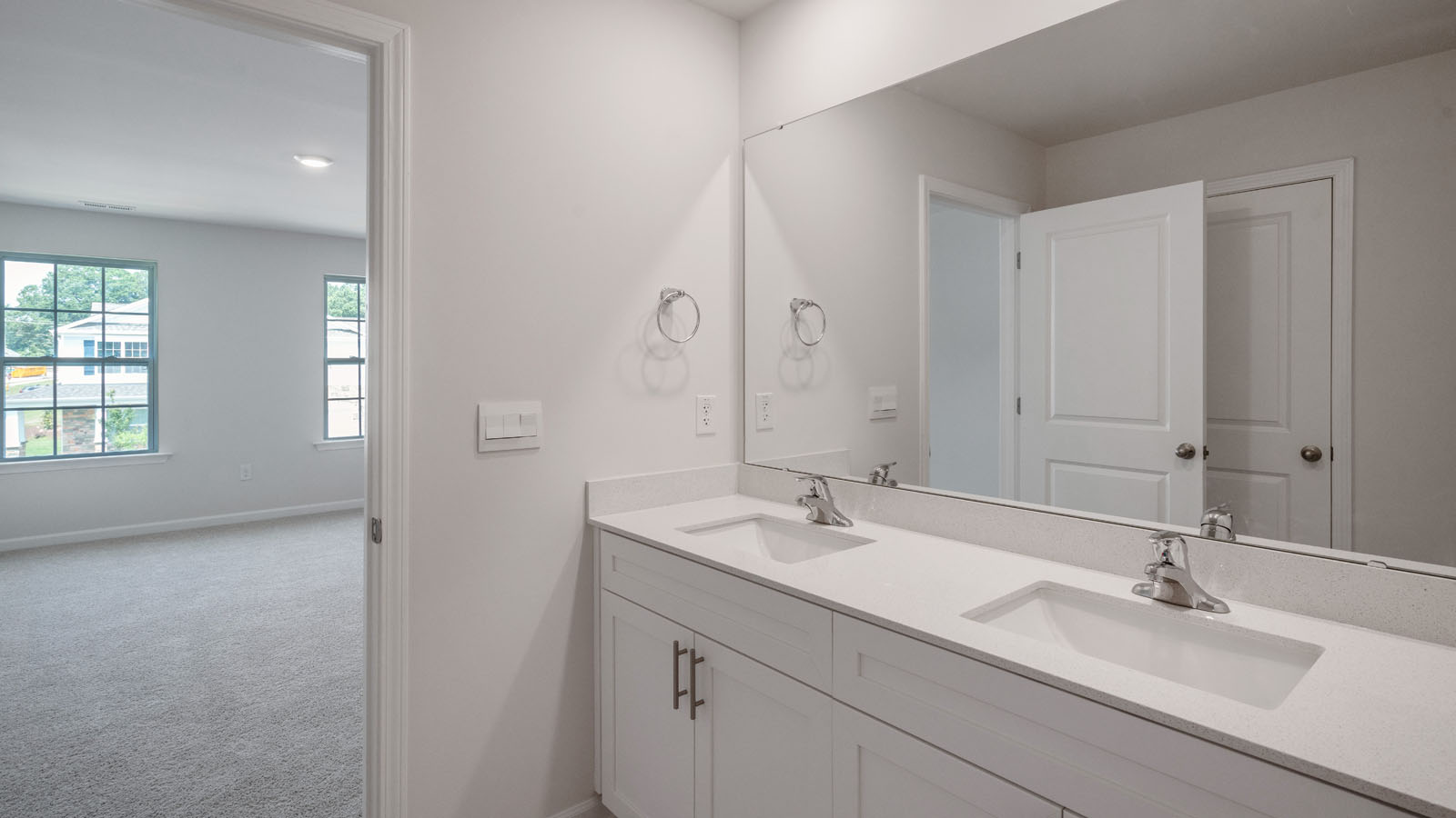 Bathroom with white cabinets