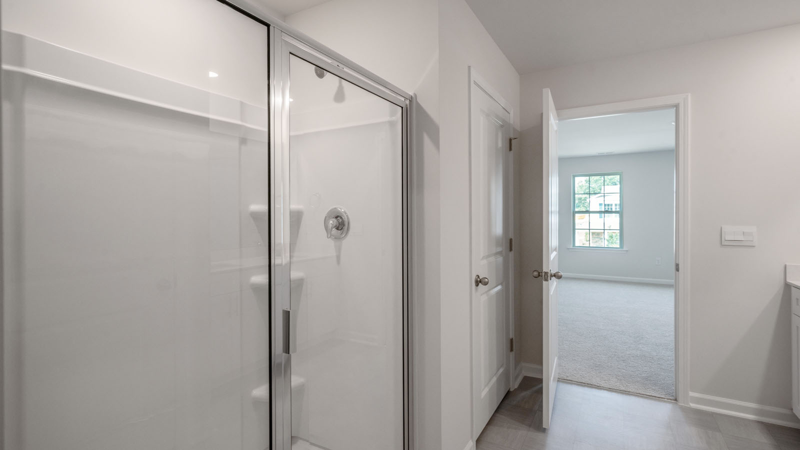 Bathroom with white cabinets