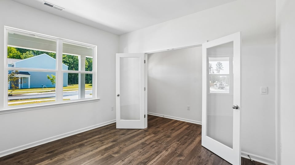 flex room with large windows, french doors