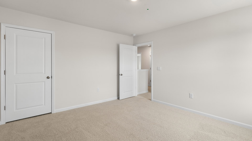 Bedroom with carpet flooring