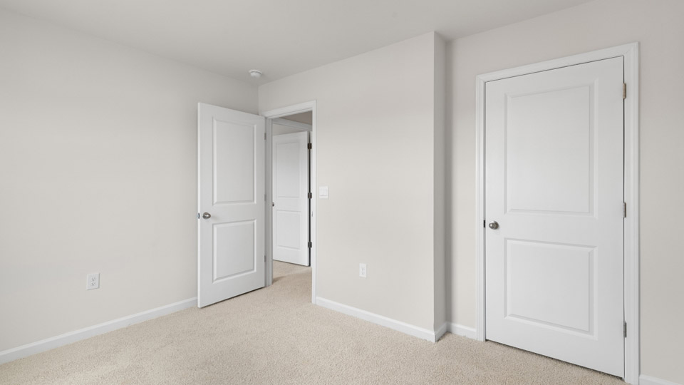 Bedroom with carpet flooring