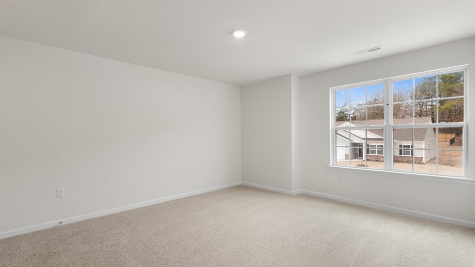 Bedroom with carpet flooring