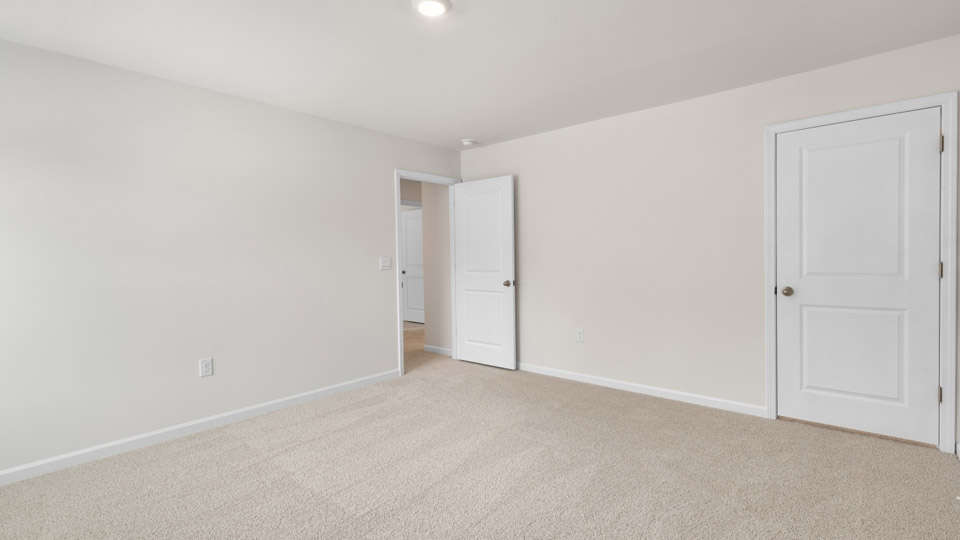 Bedroom with carpet flooring