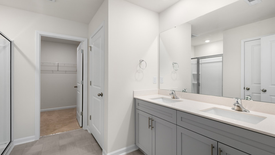 Primary bathroom with quartz counters