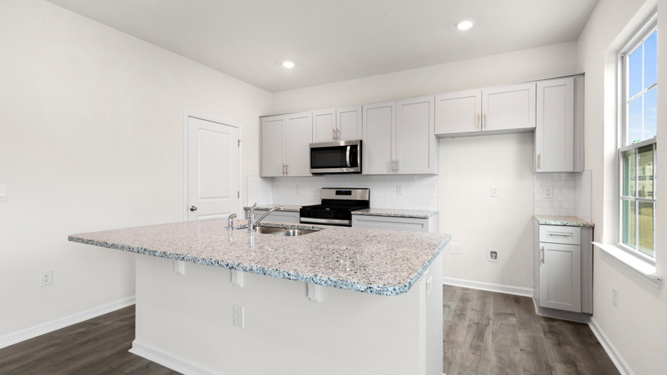 Kitchen with stainless-steel appliances