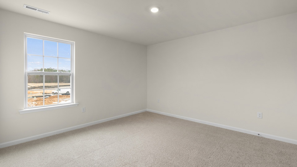 Bedroom with carpet flooring