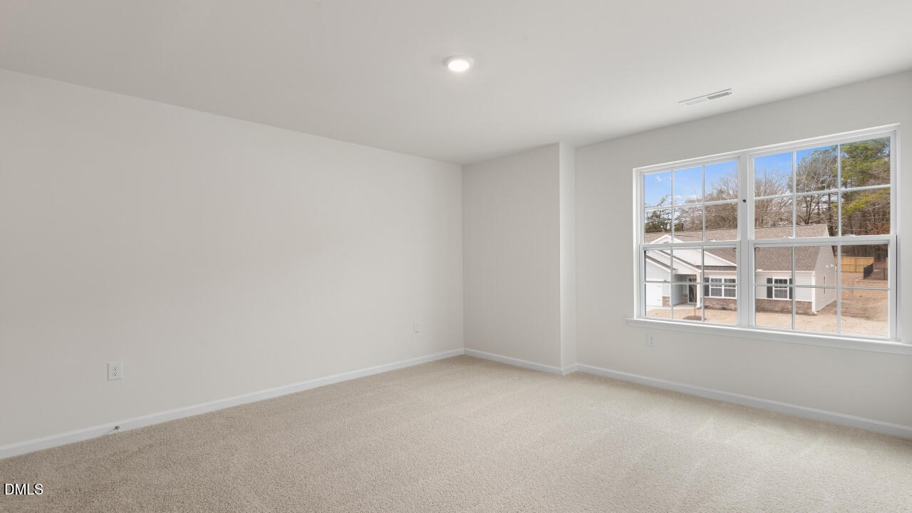 Bedroom with carpet flooring