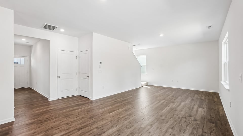 open concept living space with large windows