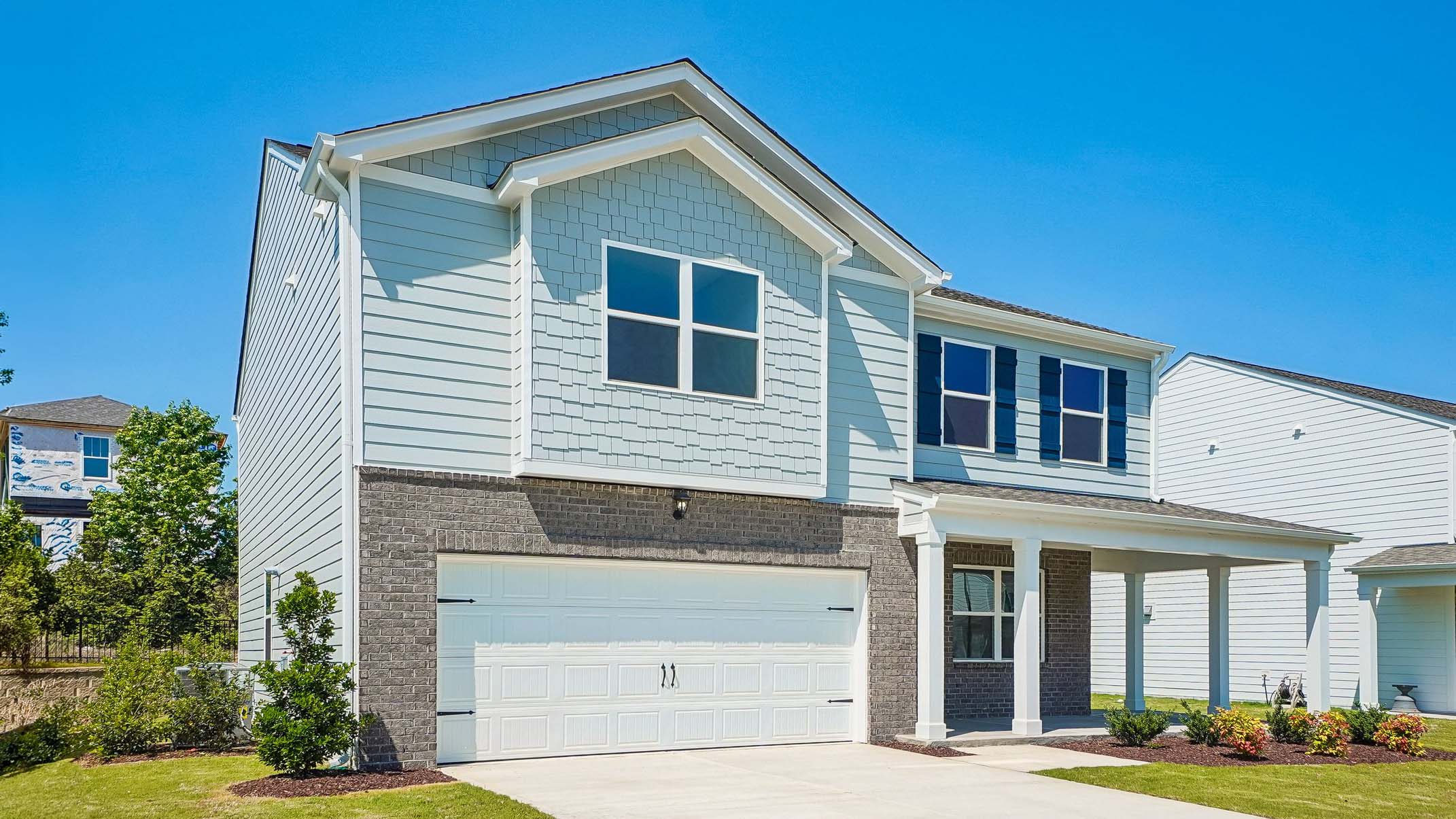 front exterior with 2 car garage