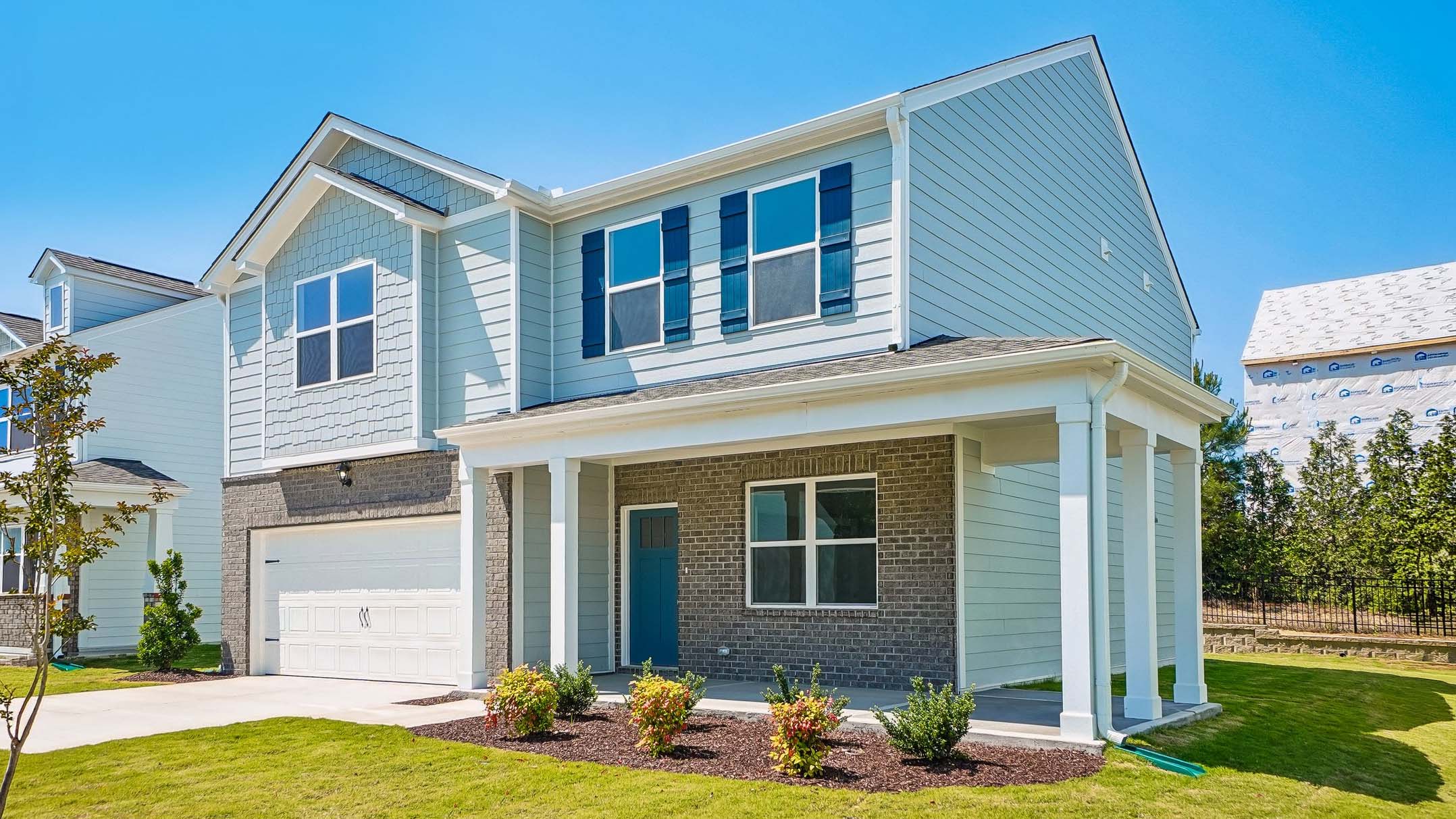 front exterior with 2 car garage