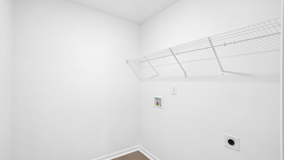 laundry room with wire shelving
