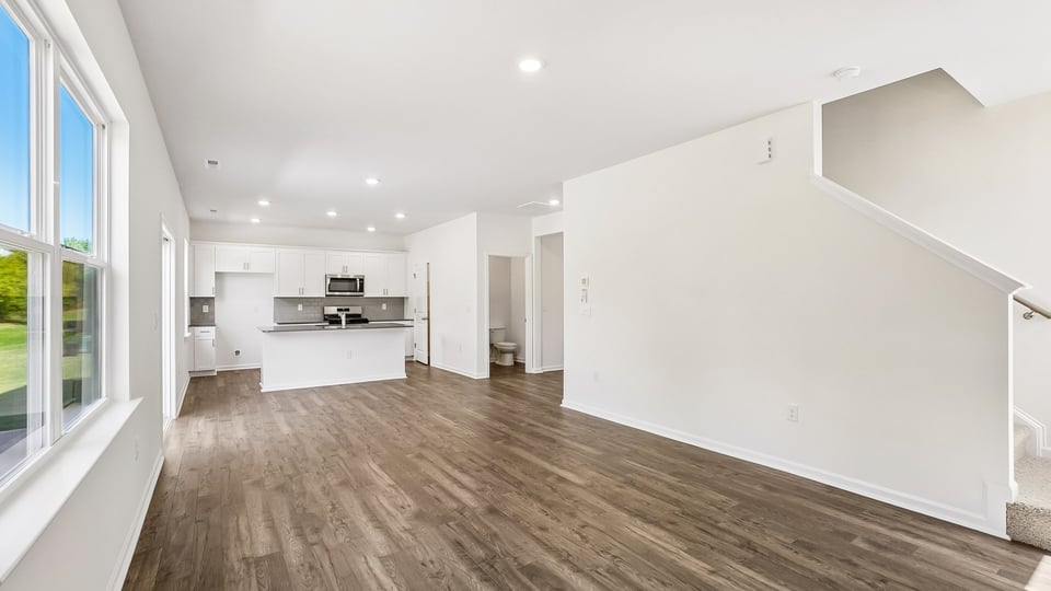 open concept living space with large windows