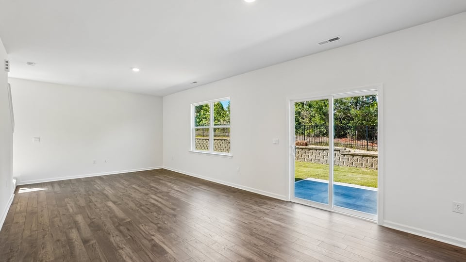 open concept living space with large windows