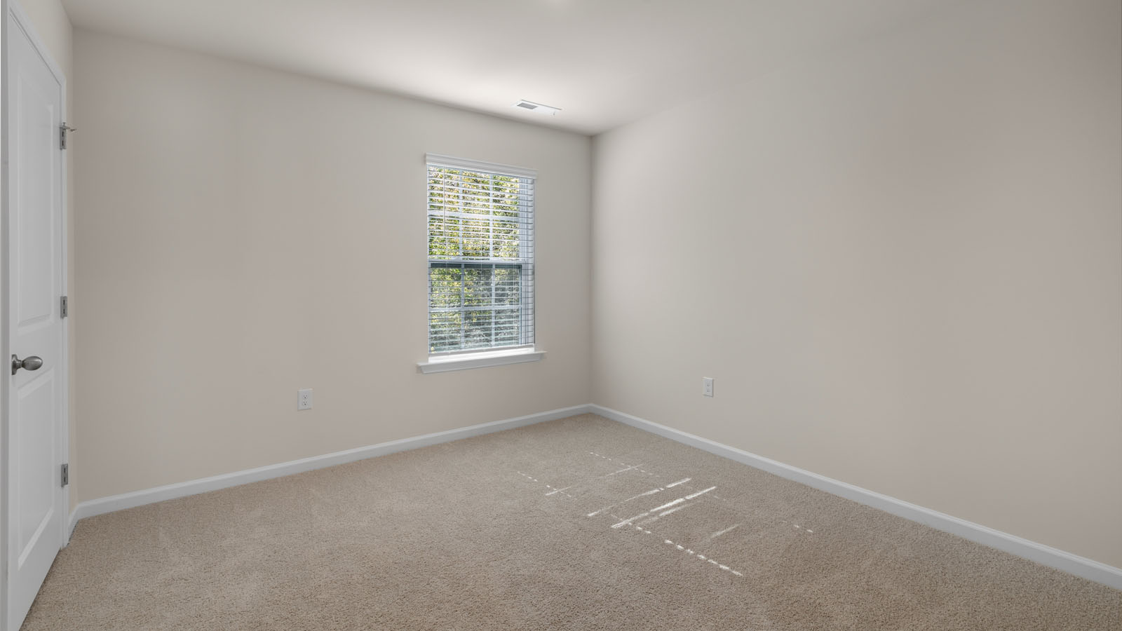 Bedroom with carpet