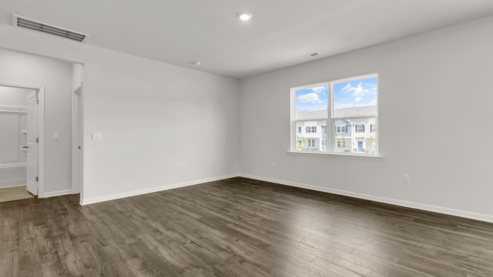 open concept living space with large windows