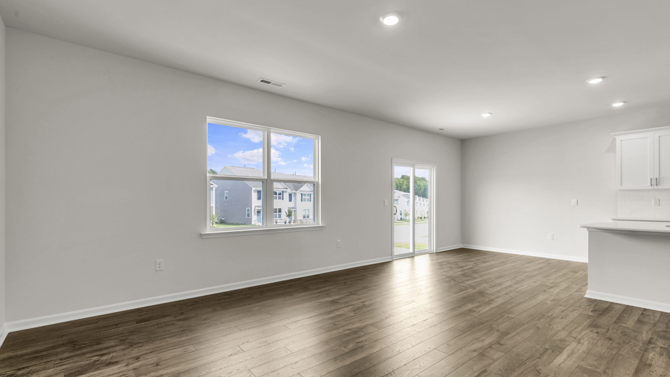 open concept living space with large windows