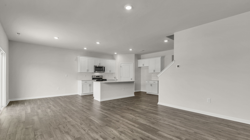 open concept living space with large windows