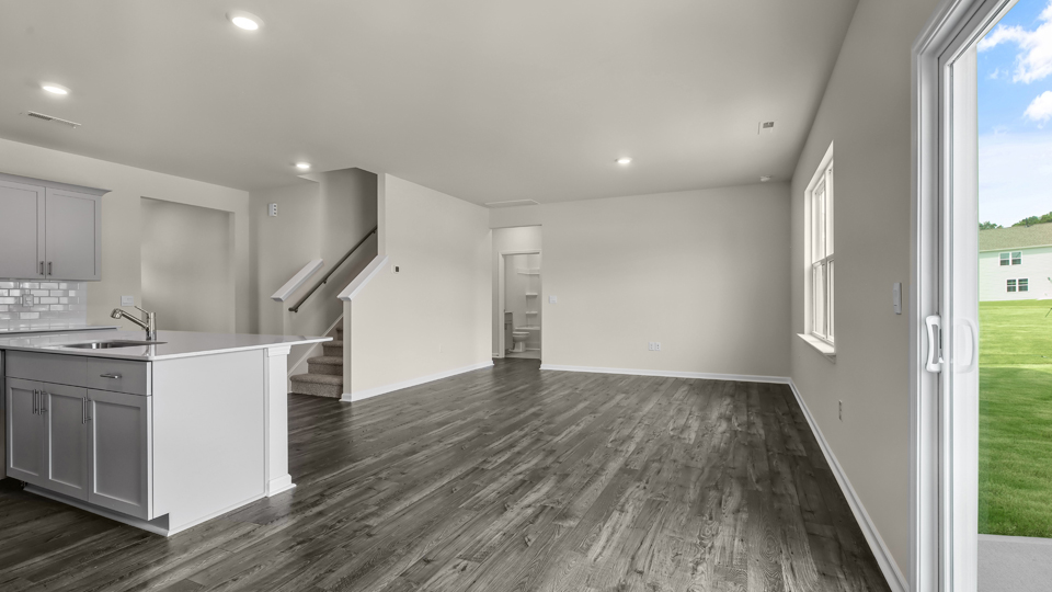 open concept living space with large windows