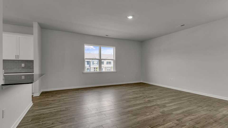 open concept living space with large windows