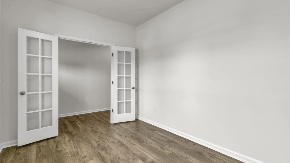 flex room with large windows, french doors