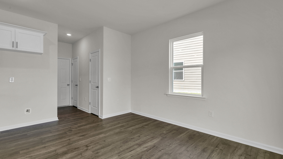 open concept living space with large windows