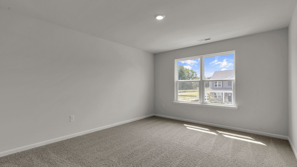 Bedroom with carpet flooring