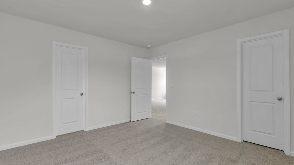 Bedroom with carpet flooring