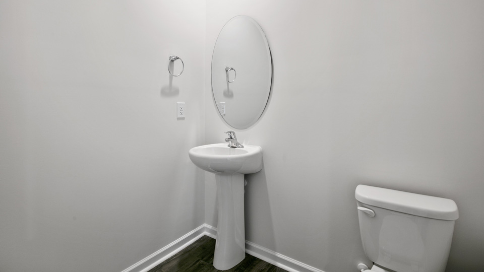 Bathroom with white cabinets