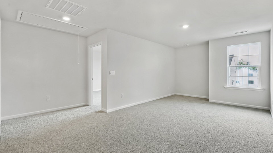 Loft area with carpet