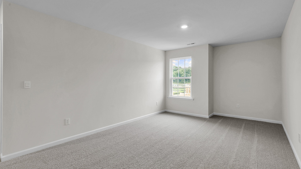 Loft area with carpet