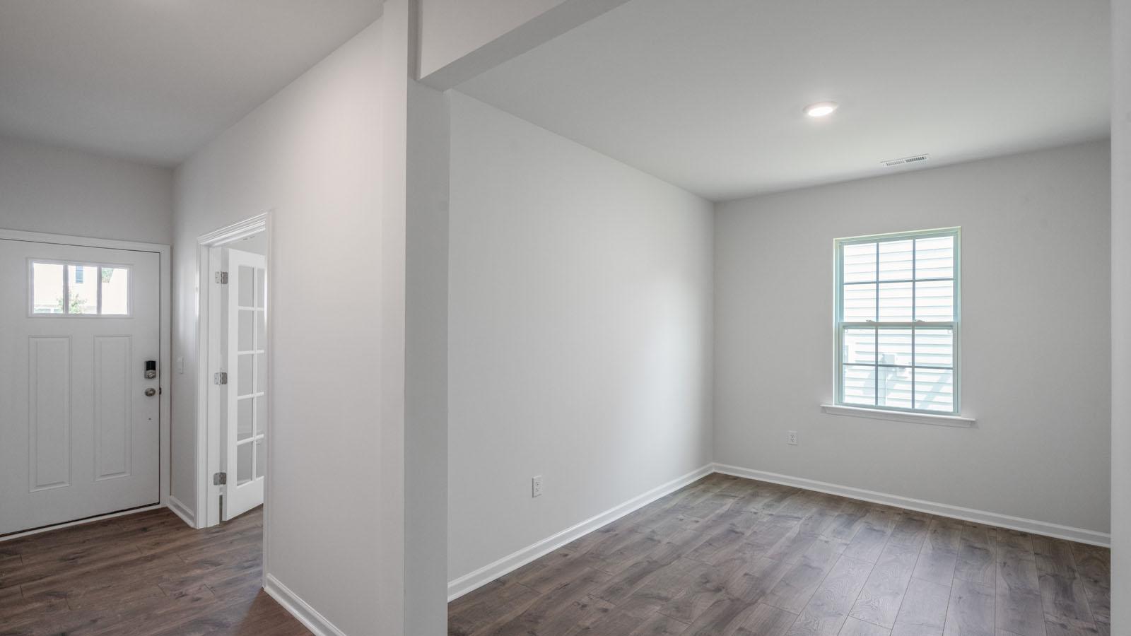 Formal dining area with revwood flooring