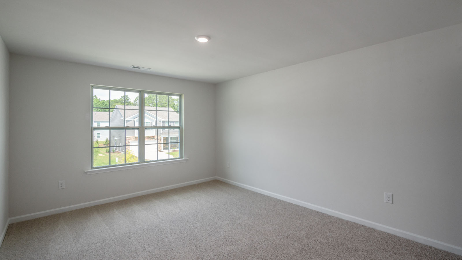 Bedroom with carpet flooring