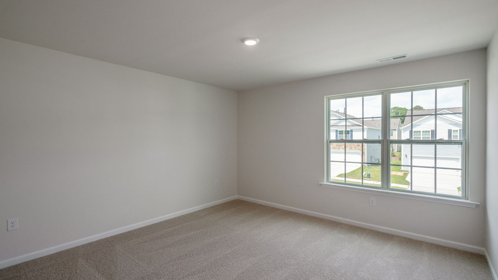 Bedroom with carpet flooring