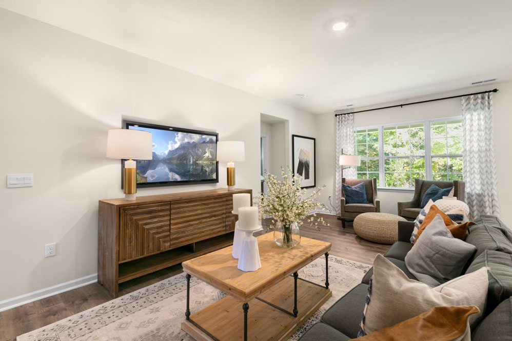 open concept living space with large windows