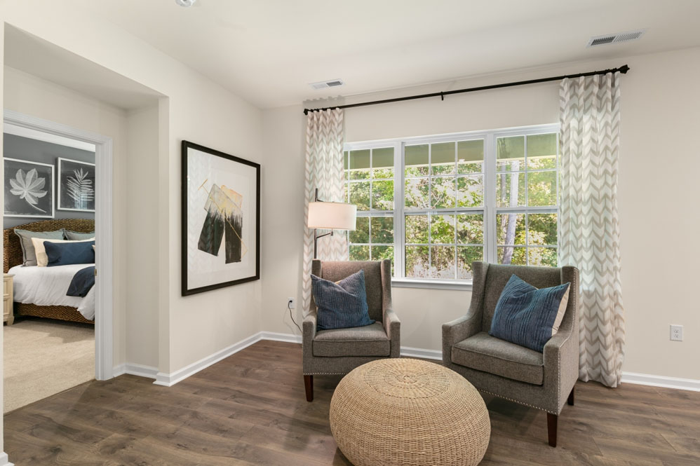 open concept living space with large windows