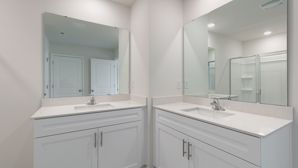 Primary bathroom with quartz counters