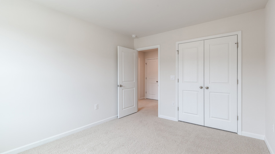 Bedroom with carpet flooring