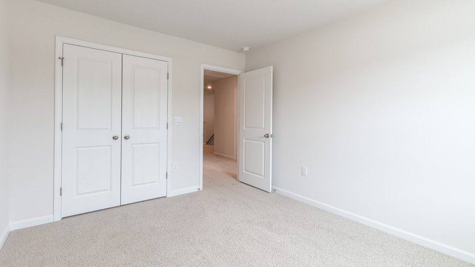 Bedroom with carpet flooring