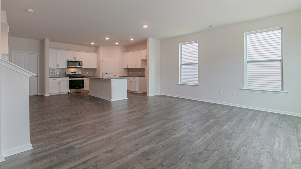 living room area with great open space and natural lighting