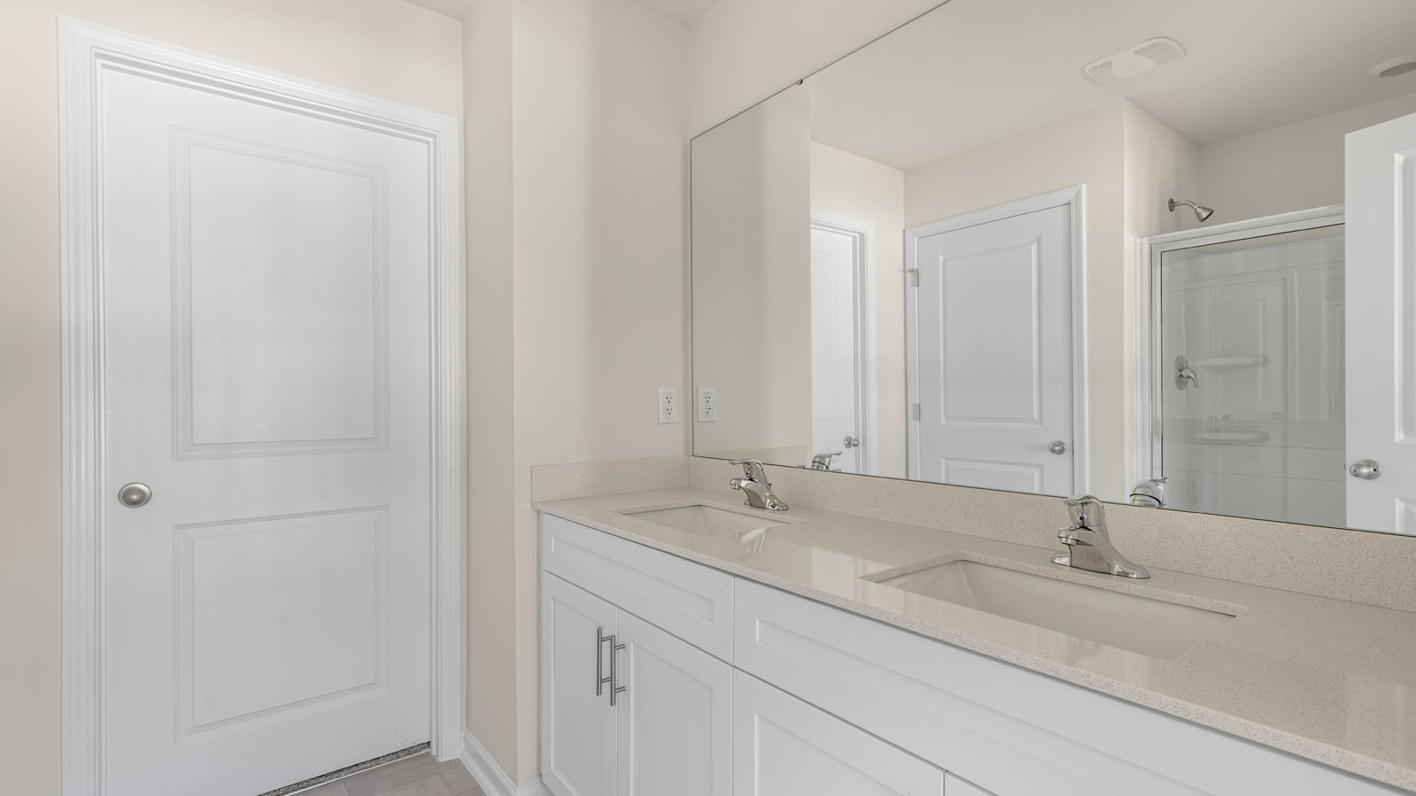bathroom with dual vanities