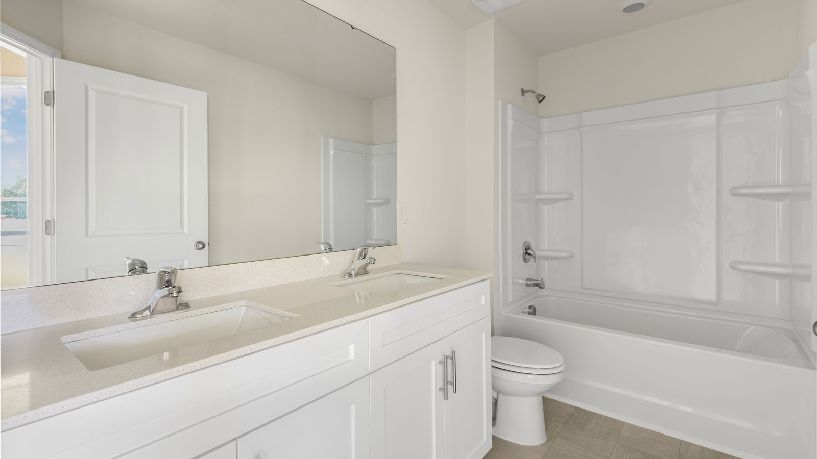 bathroom with dual vanities