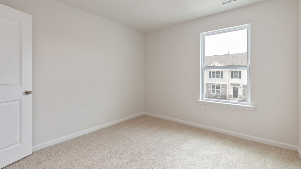 Bedroom with carpet