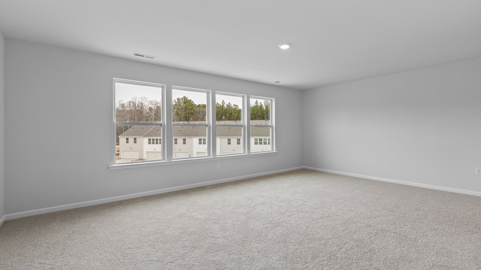 Bedroom with carpet flooring